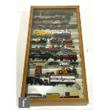 Three display cabinets, all with hinged glass fronts and glass shelves, 101 x 51cm, containing
