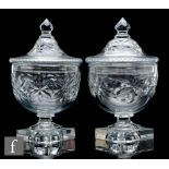 A pair of early 19th Century continental clear cut crystal glass pedestal bowls and covers in the