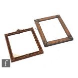 An Edwardian copper bevelled edge wall mirror 44cm x 34cm, and an aesthetic oak framed mirror,