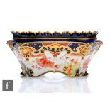 A Royal Crown Derby oval planter decorated with an Imari pattern, printed mark with date cypher
