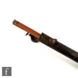 An early 20th Century billiard cue, in tapering metal case mounted with an oval brass plaque 'A W