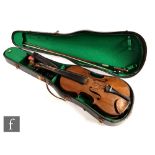 A late 19th Century violin, the interior labelled Caspar de Salo in Brescia 1885, length 36cm,