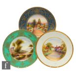 Three Royal Worcester cabinet plates each decorated with a hand painted view to the centre, the