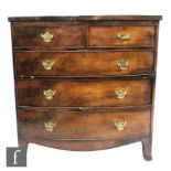 A 19th Century mahogany bow front chest of two short and three long drawers, fret brass drop