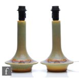 A pair of mid 20th Century Soholm 'UFO' lamp base both in an olive green glaze with brown and