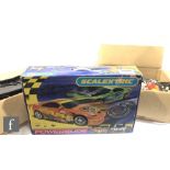 A collection of Scalextric, to include a boxed Powerslide set, and various unboxed cars, track and