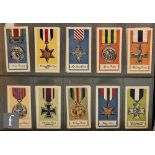 A large collection of military related cigarette and trade cards sets and facsimile sets, part