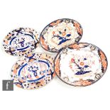A large 19th Century Davenport Chinoiserie meat plate decorated in the Imari palette with a stylised