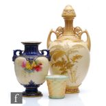 Three pieces of Royal Worcester comprising a large shape 1200 vase and cover in blush ivory with