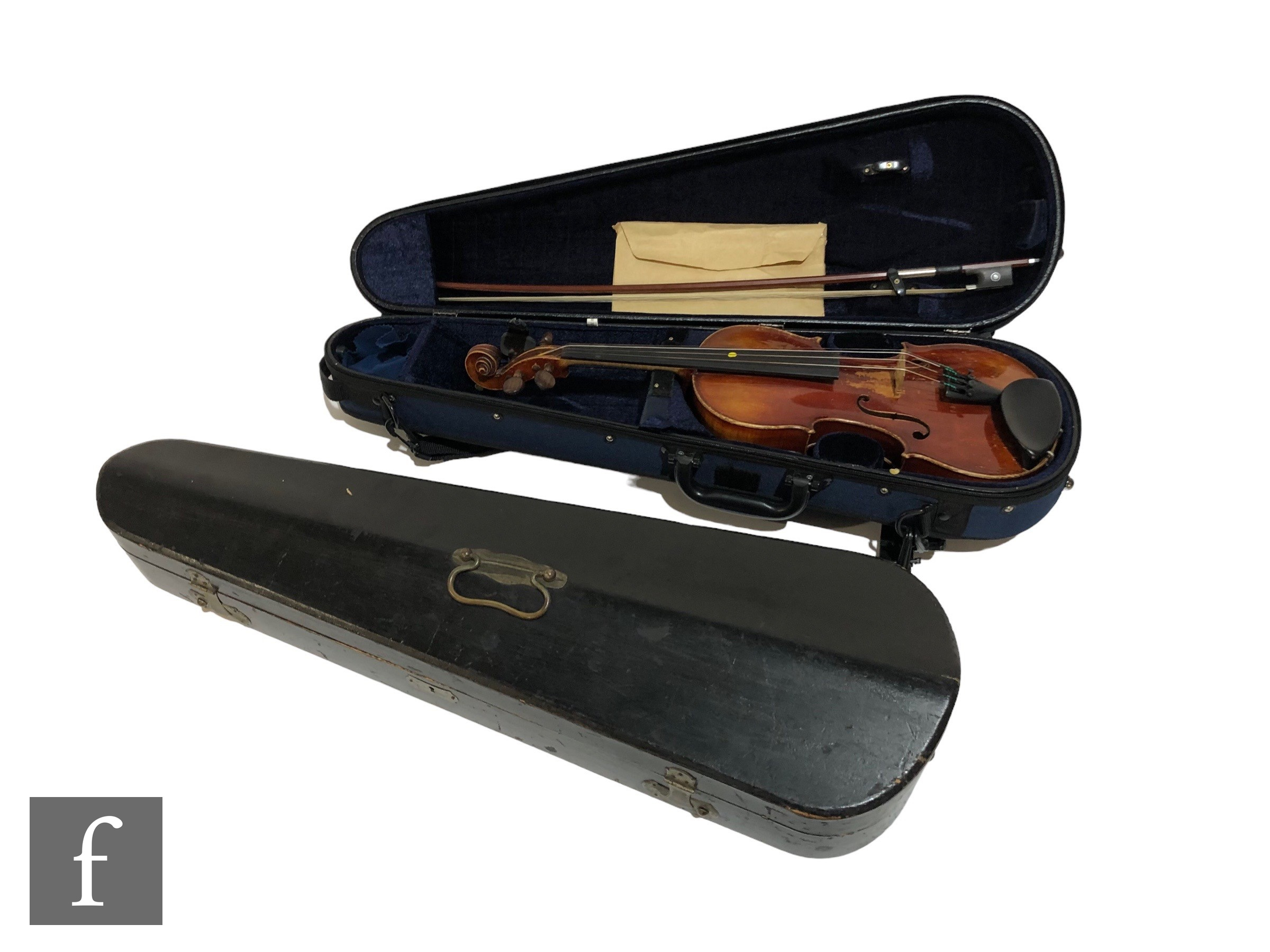 A late 19th early 20th Century violin, length 34cm, with bow, in modern blue zip case and with