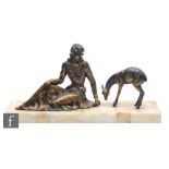 A 20th Century bronzed spelter figure, modelled as a seated female figure beside a fawn, mounted
