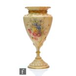 A Royal Worcester blush ivory shape 2314 vase of conical form decorated with a spray of flowers with