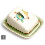 A Clarice Cliff Lynton shape cheese dish and cover circa 1936, hand painted with flower heads with