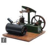A mid 20th Century or later scale cast metal model of a beam engine, painted green with separate