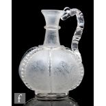 A 19th Century Richardsons carafe circa 1870, the footed globe and shaft decorated with applied