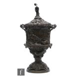 A 19th Century bronze cup and cover by Pierre Jules Mene (1810-1877), modelled as a segmented