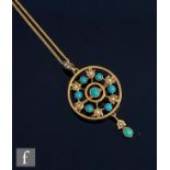 An early 20th Century 9ct seed pearl and turquoise circular open work pendant, length 4.5cm,