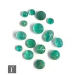 Fifteen loose cabochon cut and polished, unset emerald stones, largest diameter 6mm. (15)