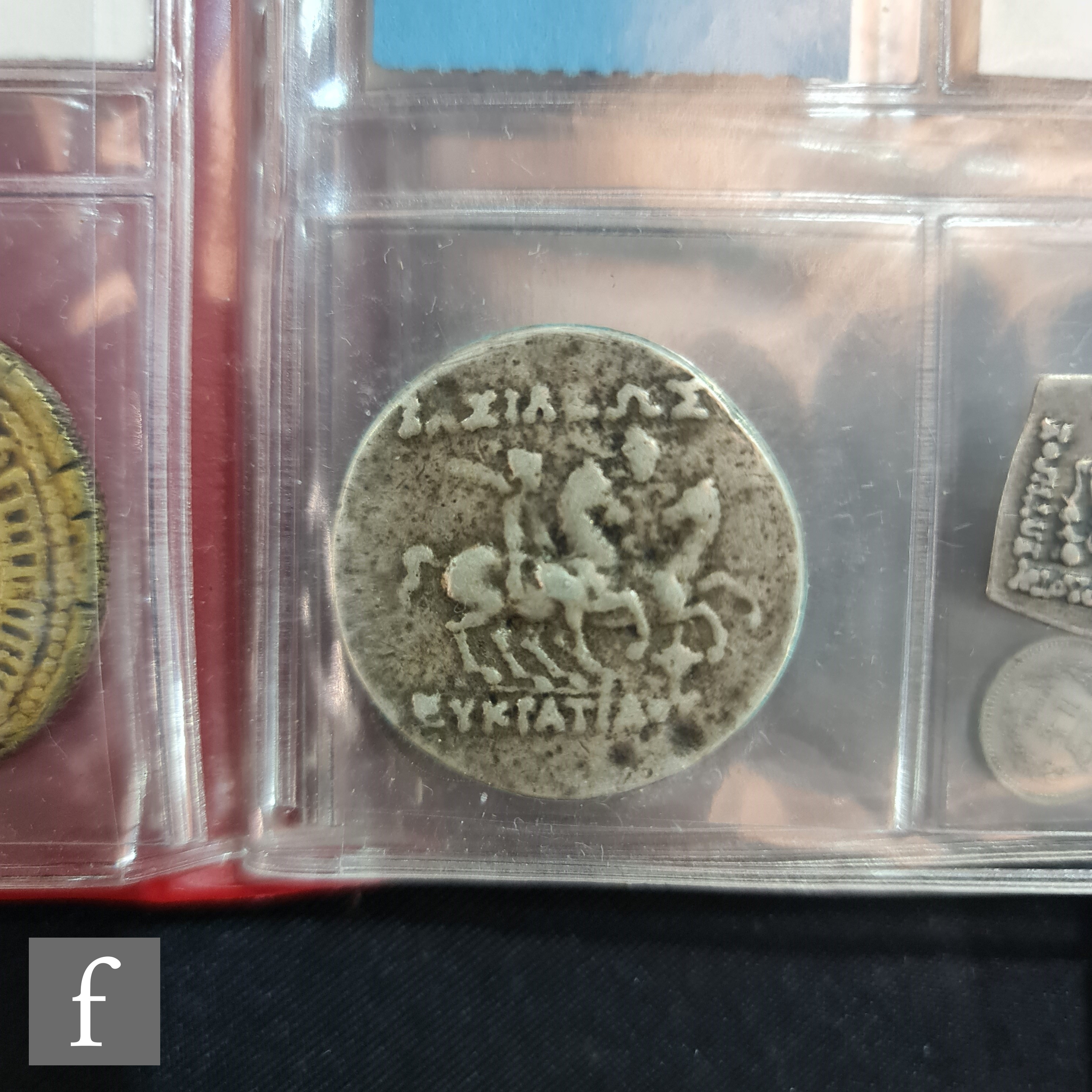 A small album containing a Roman denarius of Mark Antony, Trajan, Nero Sestertius, Hadrian and - Bild 3 aus 6