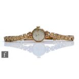 A 9ct lady's Rotary manual wristwatch with batons to a silvered circular dial, case diameter 16mm,