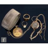 A small parcel lot of jewellery to include a 9ct lady's watch, an open locket, a chain, a signet