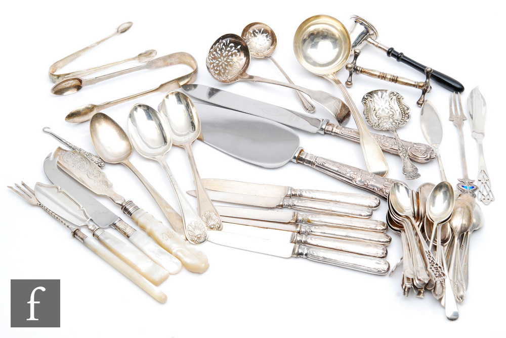 A parcel lot of assorted hallmarked silver flatware to include tea and dessert spoons, a meat