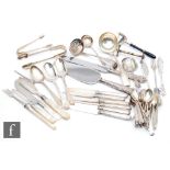 A parcel lot of assorted hallmarked silver flatware to include tea and dessert spoons, a meat