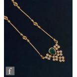 An 18ct emerald and diamond pendant, pear shaped collar set emerald above twenty individually set