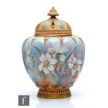 An early 20th Century Royal Worcester shape 1312 pot pourri and cover of gourd form decorated with