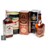 A group of blended whiskies and bourbons, to include a bottle of Jim Beam, two bottles of Grant's