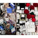 A large parcel lot of assorted costume jewellery to include earrings, bangles, bracelet, chains,