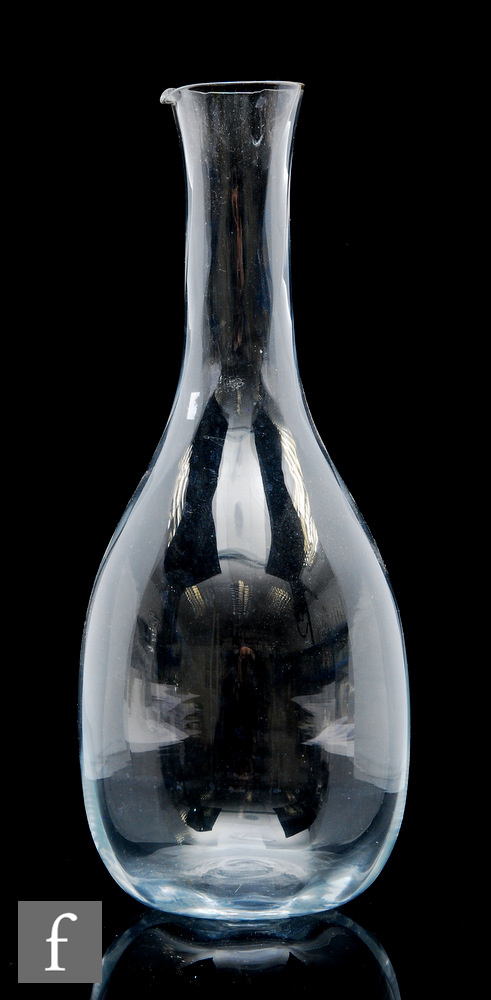 A Kosta Boda Chateau series glass carafe, designed by Bertil Vallien circa 1981, the ovoid body with