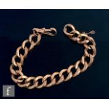 An early 20th Century 9ct rose gold open curb link bracelet, weight 21g, detailed with alternating