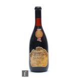 A 1977 bottle of Giovanni Scanavino Barolo Riserva, Italy, red wine, UK distributor label Evans