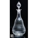 A late 19th Century Whitefriars Roman Cutting glass decanter designed by Harry Powell, circa 1894,