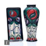 A Moorcroft Pottery vase decorated in the Tribute to Charles Rennie Mackintosh pattern designed