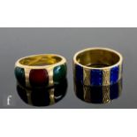 Two modern 18ct rings one with blue enamel decorated panels, the other with red and green enamel,