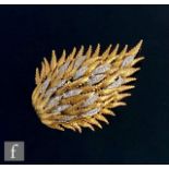 A mid 20th Century 18ct hallmarked brooch modelled as stylised pinecone highlighted with diamond set