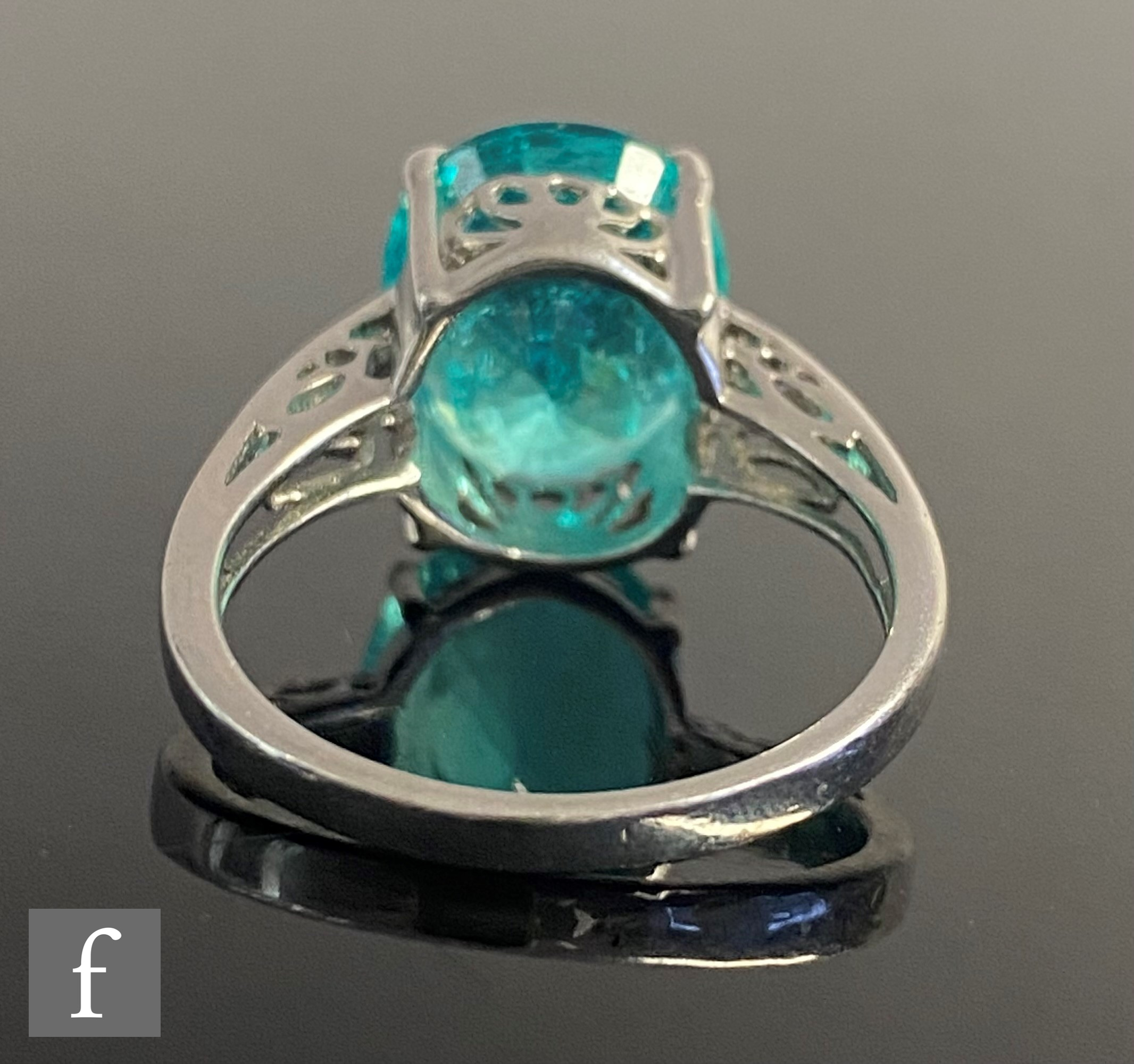 An 18ct white gold single stone, claw set paraiba tourmaline, weight approximately 6.78ct, to - Image 3 of 8