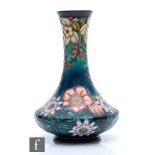 A Moorcroft Pottery vase decorated in the Carousel pattern designed by Rachel Bishop,