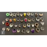Thirty nine assorted silver, white metal and other rings to include stone set and signet styles