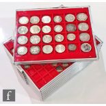 Eight Lindner trays of various coins from German States, Italy, Portugal, Ceylon and Cyprus, some