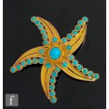 A continental 18ct brooch modelled as a starfish with individually turquoise set stones to centre
