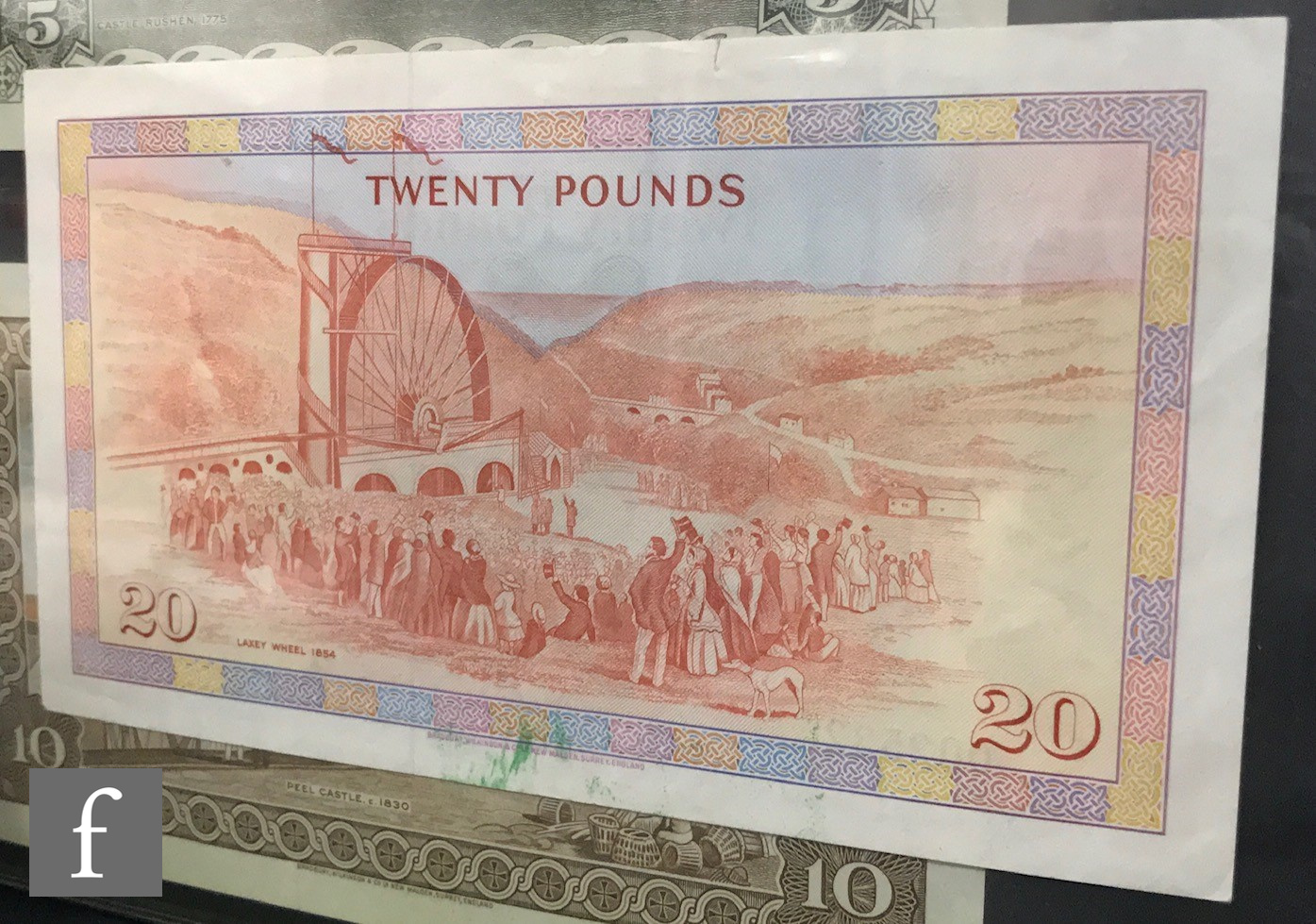 An album of Guernsey, Jersey and Isle of Man banknotes to include fifty, twenty, ten, five and one - Image 11 of 13
