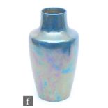 A Ruskin Pottery vase of high shouldered form decorated in a mottled blue to green souffle glaze