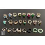 Twenty four assorted silver, white metal and other rings to include stone set and other examples. (