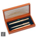 A cased set of three 9ct hallmarked Parker writing implements, a fountain pen, a biro and a