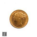 A Victoria bun head full sovereign dated 1872.