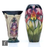 Two boxed Moorcroft Pottery vases, the first of slender form decorated in the Pink Orchid pattern