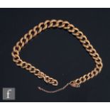 An early 20th Century 9ct rose gold graduated solid curb link bracelet, weight 25g, length 20cm,